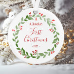 Baby's First Christmas Photo Wreath Red Text Ornament<br><div class="desc">This design features a watercolor Christmas wreath surrounding your baby's name,  "First Christmas, " and the year in whimsical red printing and handwriting fonts. Customize the reverse side with a favourite photo of your baby,  encircled by the same wreath.</div>