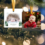 Baby's First Christmas Rustic Trees Photo Ceramic Ornament<br><div class="desc">Baby's First Christmas! Cute, Modern yet Rustic Christmas Holiday Photo Square Ornaments featuring adorable little forests of rustic Christmas trees and Merry Christmas in modern typography. Add 2 of your favorite photos for the perfect ornament! Please contact us at cedarandstring@gmail.com if you need assistance with the design or matching products....</div>