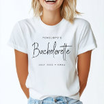 Bachelorette | Modern Minimalist Script Bridesmaid T-Shirt<br><div class="desc">This Bachelorette Party custom design features a handwritten script typography. You can easily personalize the bride-to-be's name,  date,  bridemaid's name or your custom message! The perfect elegant accessory for a bachelorette party or bachelorette weekend!</div>