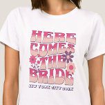 Bachelorette Party Here Comes The Bride Groovy T-Shirt<br><div class="desc">Make a splash at your upcoming bachelorette party with this stunning bachelorette party personalized t-shirts. Whether you're celebrating a bach trip, a girls' vacation, or a best friends' holiday, this custom beach bachelorette party t-shirts are the perfect addition to your unforgettable getaway. Add a personal touch to your bachelorette party...</div>