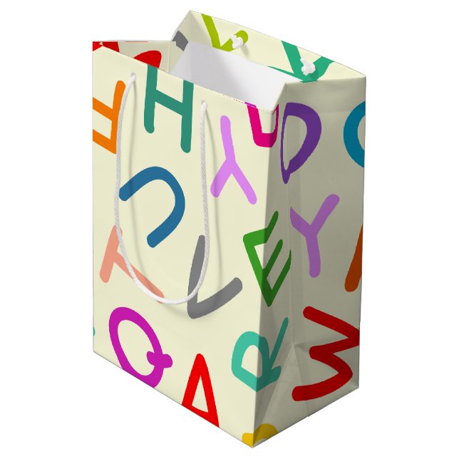 Back to school letters in a yellow background medium gift bag (Back Angled)