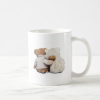 Back view of two Teddy bears hugging each other