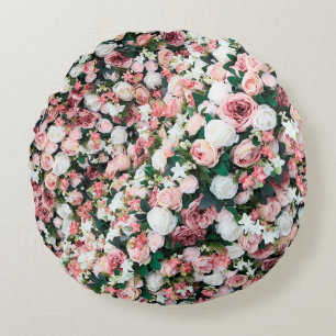 Background of bright colorful artificial flowers.  round pillow
