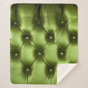 Background texture of dark green capitone genuine sherpa blanket