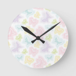 Background with butterflies in watercolor round clock