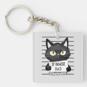 Bad Cattitude – Black Cat Mugshot Keychain