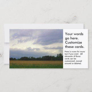 Bad weather approaching farm fields storm clouds