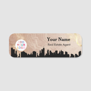 Badge de nom de bien immobilier avec Skyline & Log