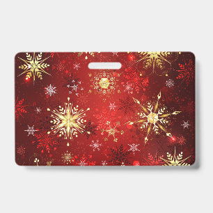 Badge Flocons de neige dorés de Noël sur fond rouge