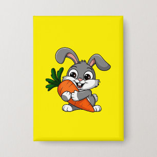 Badge Lapin jouant avec une grande carotte