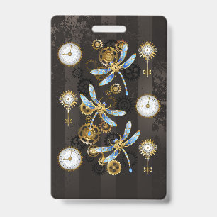 Badge Libellules Steampunk sur fond rayé marron