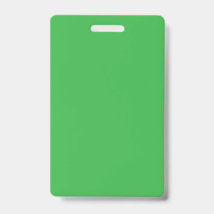 Badge un arrière - plan vert avec une bordure blanche