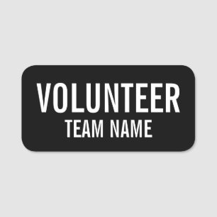 Badge volontaire noir avec nom d'équipe personnali