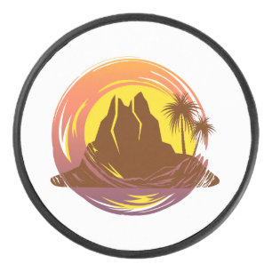 Badge with tropical volcano scenery and palm trees hockey puck