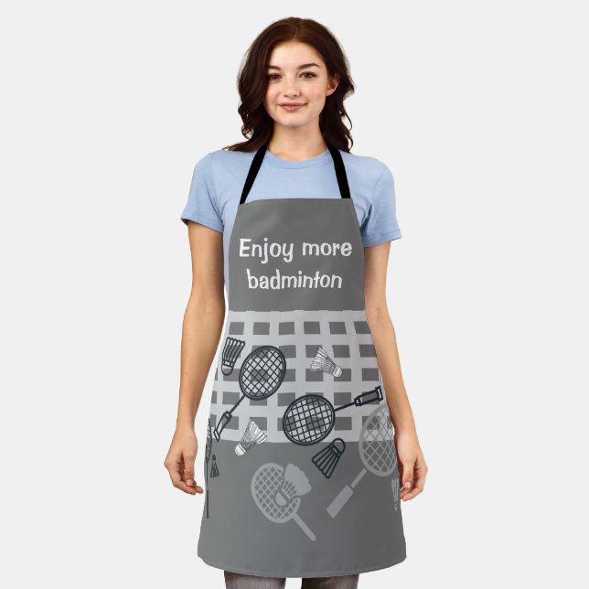 Badminton shuttlecock black and white on grey apron (Worn)