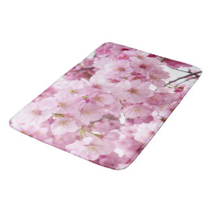 Bain Les fleurs de cerisier fleurissent le tapis de