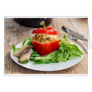 Baked stuffed peppers with meat sauce and cheese