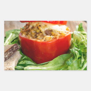 Baked stuffed peppers with meat sauce and cheese sticker