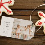 Baking Spirits Bright | Fun Kids Photo Neutral Gift Tags<br><div class="desc">Stylish modern holiday baking photo gift tags with a classic typography quote "baking spirits bright" with a dividing line and family name in white. The design features a neutral natural soft taupe ivory cream colour. The photo, greeting and name can be easily customized for a design as unique as your...</div>