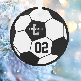 Bal de football et joueur de football Photo
