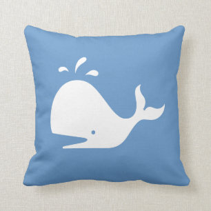 baleine blanche CARTOON sur coussin bleu