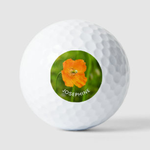 Balles De Golf Fleur de pavot orange sur photo verte avec nom