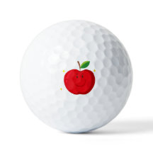 Pomme rouge avec un visage heureux