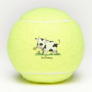 Balles De Tennis Vache mignonne en vert dessin animé sur le terrain