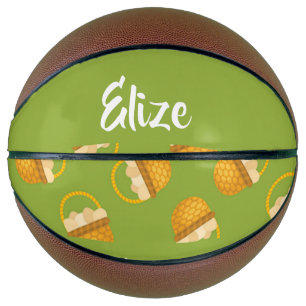 Ballon De Basket Oeufs en corbeille marron sur vert