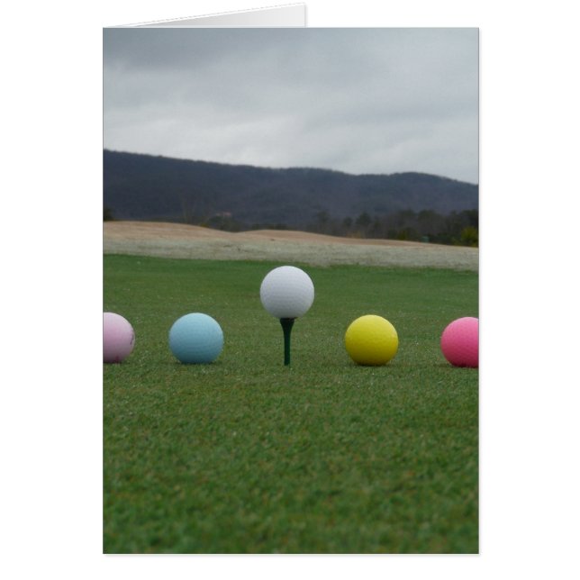 Ballons de golf aux couleurs vives sur une montagn (Devant)