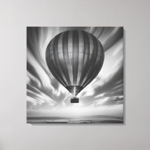 Balloon’s Voyage: A Serene Monochrome Ascent” Canvas Print