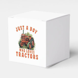 Ballotins Garçon de la vie rurale qui aime les tracteurs