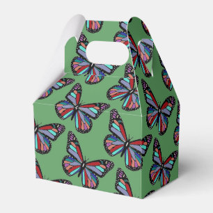 Ballotins Motif de papillon coloré assez orné sur fond vert