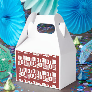 Ballotins Un tapis rouge avec un motif texturé est étalé sur