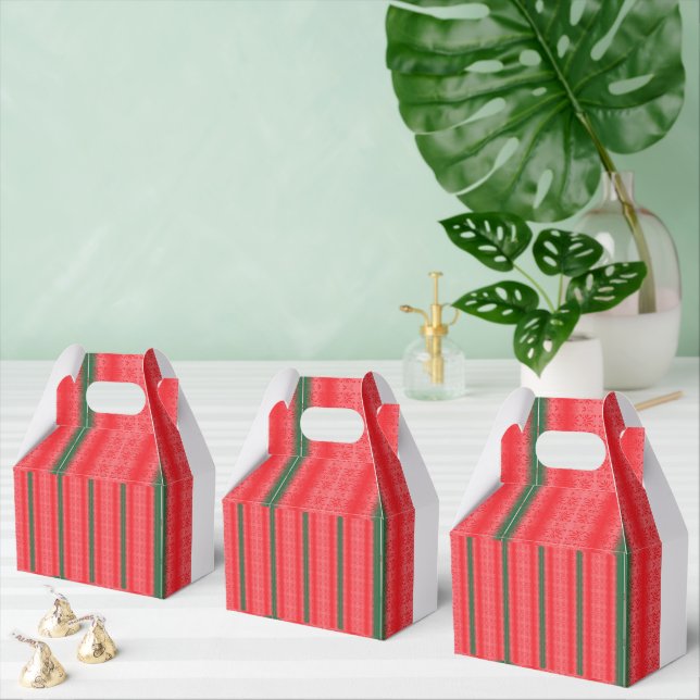 Ballotins Une pomme rouge vif est posée sur une surface blan (Multiple)