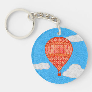 Ballotte à air chaud, Coral Orange contre un ciel