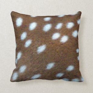 Bambi white spots on a brown fur throw pillow