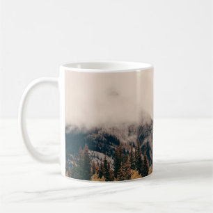 Banff national park foggy mountains and forest in coffee mug