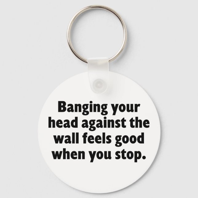 Banging your head against a brick wall keychain (Front)