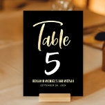 Bar Mitzvah Black Gold Script Modern Bold Elegant Table Number<br><div class="desc">No Bar Mitzvah party is complete without personalized table number cards. Let your son be proud, rejoice and celebrate his milestone at his perfectly coordinated party. Stunning, modern, bold gold faux foil handwritten script overlays a sophisticated, dramatic black background. Personalize the custom text with the table number, his name, and...</div>