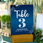 Bar Mitzvah Modern Navy Blue Ombre Agate Script Table Number<br><div class="desc">No Bar Mitzvah party is complete without personalized table number cards. Let your son be proud, rejoice and celebrate his milestone at his perfectly coordinated party. White calligraphy script, light blue grey and white typography, and steel blue agate rocks accented with faux silver veins overlay a deep navy blue ombre...</div>