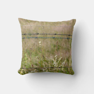 Barbed wire fence throw pillow