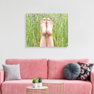 bare feet in meadow wildflowers canvas print