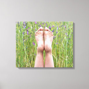 bare feet in wildflowers canvas print