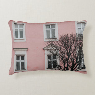 BARE TREE IN FRONT OF PINK BUILDING ACCENT PILLOW