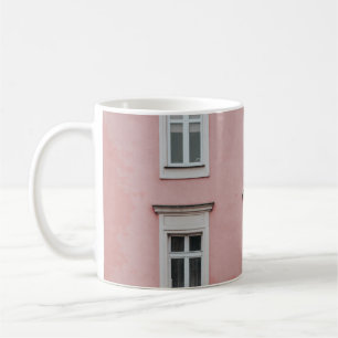 BARE TREE IN FRONT OF PINK BUILDING COFFEE MUG