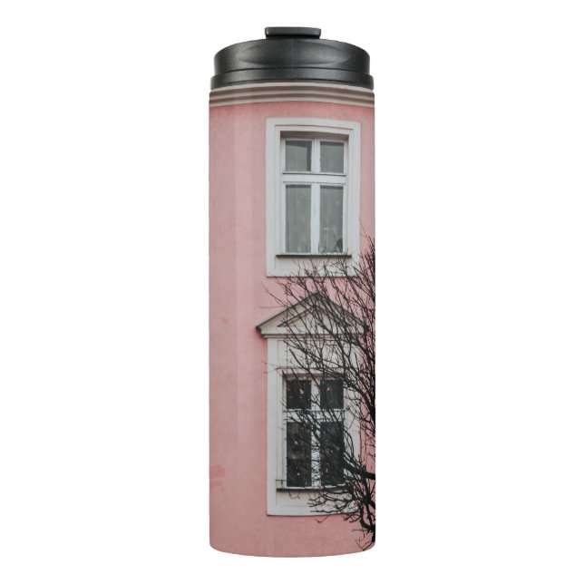 BARE TREE IN FRONT OF PINK BUILDING THERMAL TUMBLER (Front)