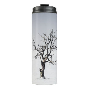 BARE TREE IN THE MIDDLE OF SNOW THERMAL TUMBLER