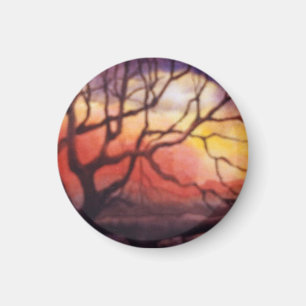 Bare winter tree with intense fiery sunset magnet