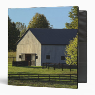 Barn on thoroughbred horse farm at sunrise, binder